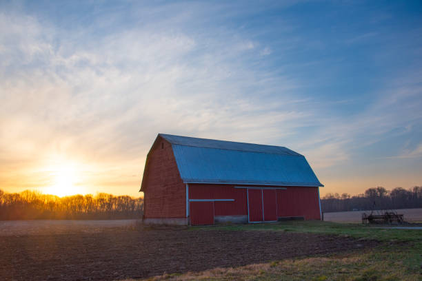 istock Red Barn at sunrise- Cass County, Indiana 2156486688