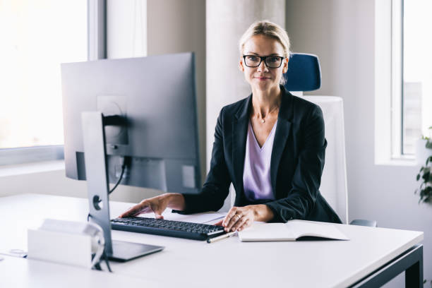 istock Businesswoman working with computer at the office 2156487799