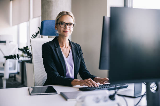 istock Businesswoman working with computer at the office 2156487807