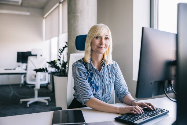 istock Businesswoman working with computer at the office 2156487818