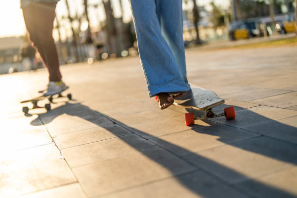 istock Diverse Friends Enjoy Longboarding Together 2156488738