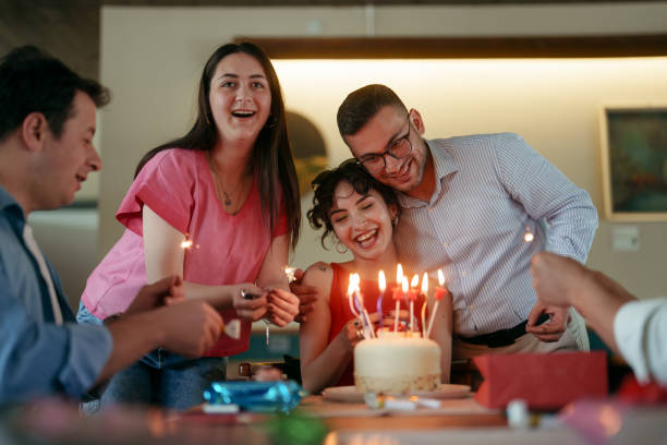istock People are celebrating birthday at the restaurant 2156489028