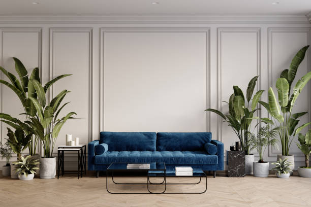 istock Mid-century modern classic white interior with blue sofa, tropical plants, coffee tables and decor. 3d render illustration mockup. 2156492157
