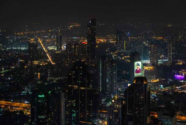 Bangkok, Thailand - March 11, 2024: A picture of the Bang Kho Laem and Sathon districts of Bangkok at night.
