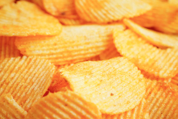 istock Potato chips , delicious BBQ seasoning spicy for crips, thin slice deep fried snack fast food. 2156497307