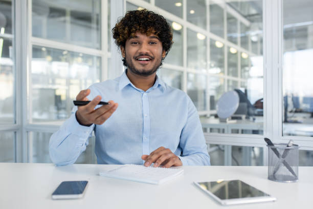 istock Young businessman giving a presentation in modern office 2156502764