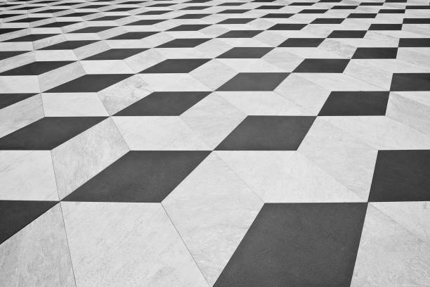 istock Modern paving made with stone blocks diamond-shaped white, black and gray in colour in a pedestrian zone 2156504248