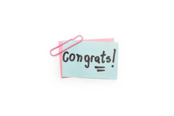 Congrats word on a blue sticky paper on a white background