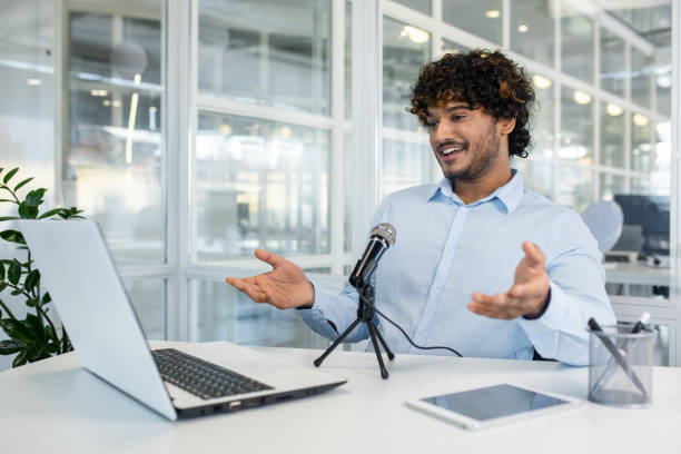 istock Young professional engaging in an animated online discussion 2156505221