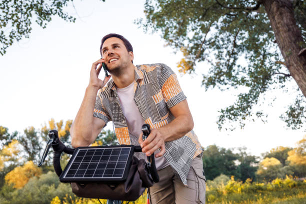 An electric bicycle charging batteries. Brandless bicycle. No real prototype.
