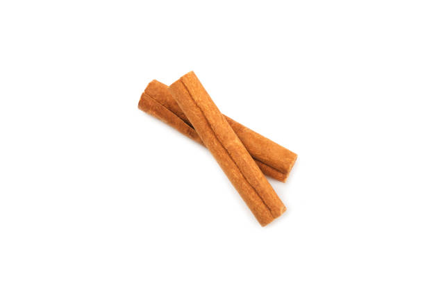 istock Cinnamon sticks on  background. Cinnamon roll. Spicy spice for baking, desserts and drinks. Fragrant ground cinnamon. cinnamon powder Close-up. Place for text. copy space 2156507170