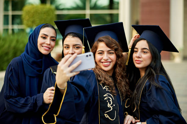 istock Happy graduate Saudi women taking selfie 2156508680