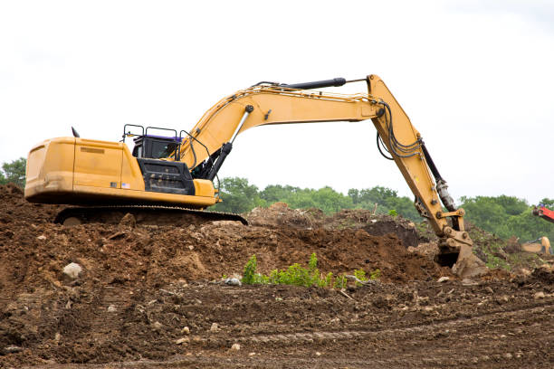 istock Excavator heavy machinery digging at construction site 2156513133