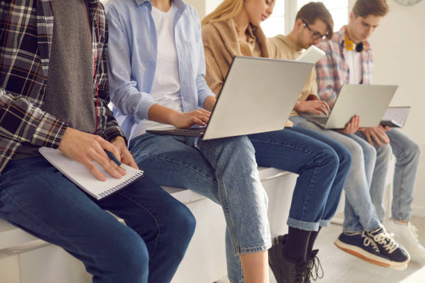 istock Diverse high school teenager student group studying using laptop cropped shot 2156513229
