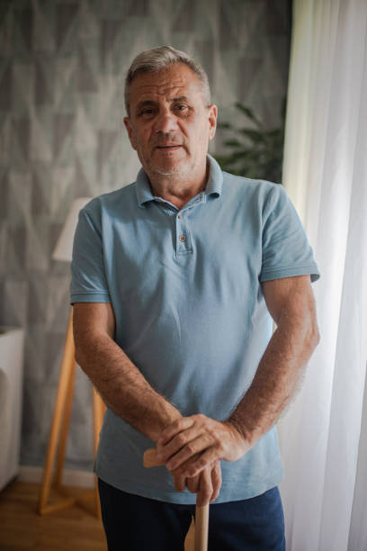 istock Portrait of an elderly man with a walking stick 2156515640