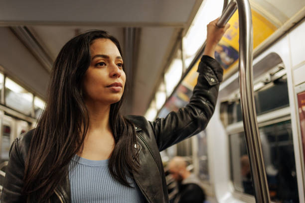 istock A young woman with a determined facial expression on her way to work 2156515758