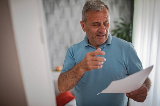 istock Elderly man in front of the mirror 2156517427