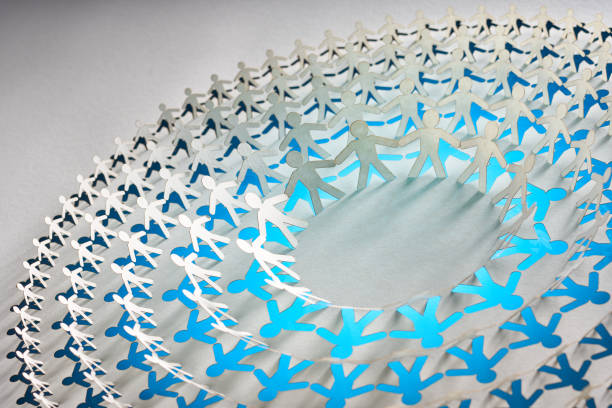 istock Intricate Paper Cut Artwork of Human Figures with Blue to White Gradient on Light Background 2156519941