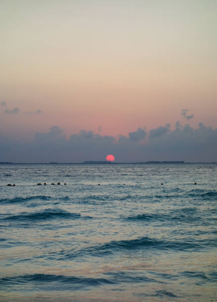 beautiful dramatic sunset over the sea waters.