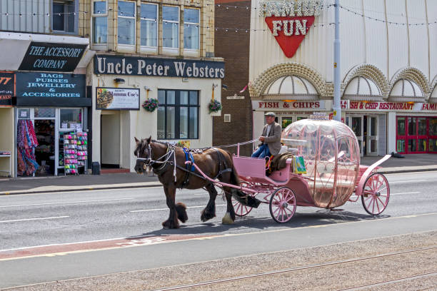 View of a Horse Drawn Carriage Blackpool, UK.  People can be seen on the carriage