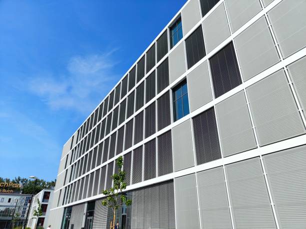 istock Modern Office Building with Geometric Facade and Blue Sky 2156531081