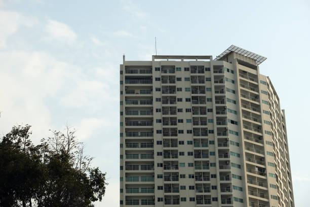gray multi-story building with many balconies