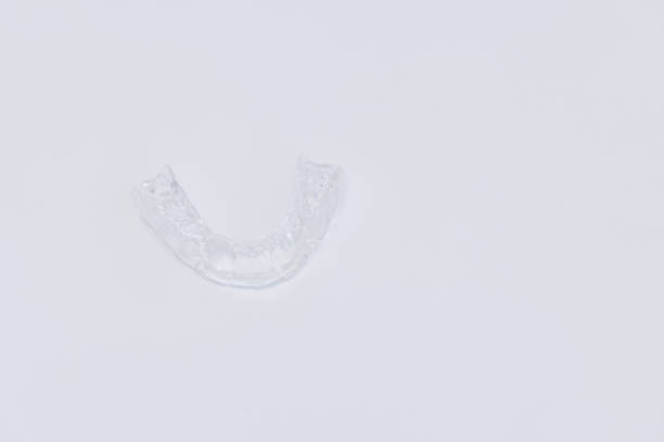 istock Splint for teeth to align the jaw on a white background 2156539881