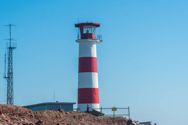 istock beautiful old lighthouse, red white, White Sea, 2156544345