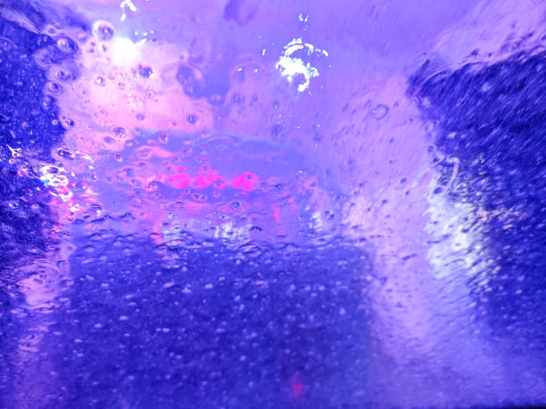 Automatic car wash in action. Car wash concept. Automated technology