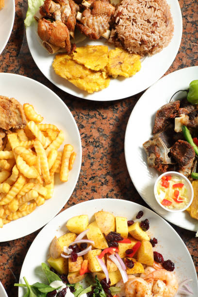 istock Group of Caribbean food dishes on table 2156558319