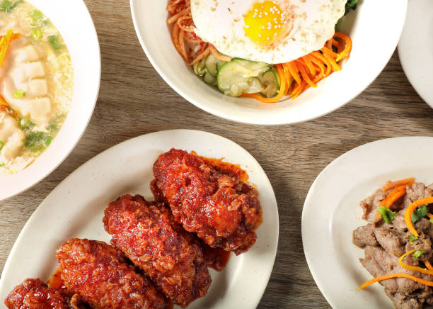 Group of Asian food dishes on table