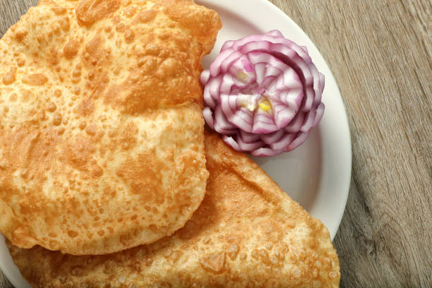 istock Indian Food Dish in plate on wooden table 2156561272