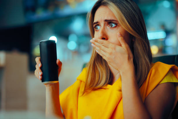 Woman Having a Soda Drink Burping from Gas Bubbles