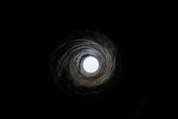 istock Close-Up View Inside a Gun Barrel Revealing the Rifling Spiral Pattern 2156569026