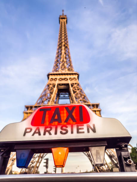 istock A Taxi Waits at the Eiffel Tower. 2156569893