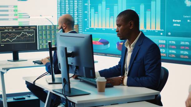 istock Pleased general director showing statistics data flyers to his team 2156571168