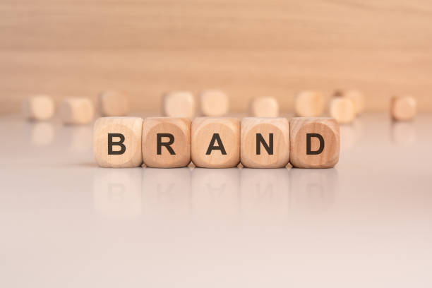 istock wooden blocks with text BRAND on brown background 2156575127