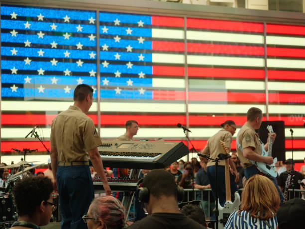 New York City, NY, USA - 26 May 2024 What the day brings on roads closed for Memorial Day events. People, crowds and various events. US Marines' live music event