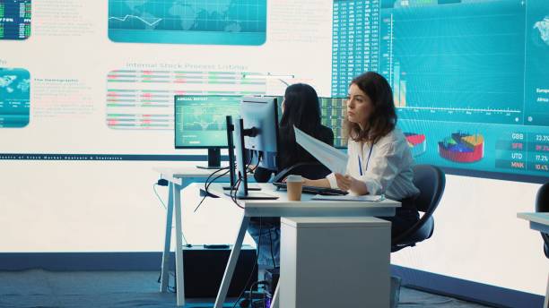 istock Business specialist reviewing key performance indicators within firm activity 2156577568
