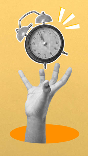 istock A human hand showing an alarm clock 2156579124