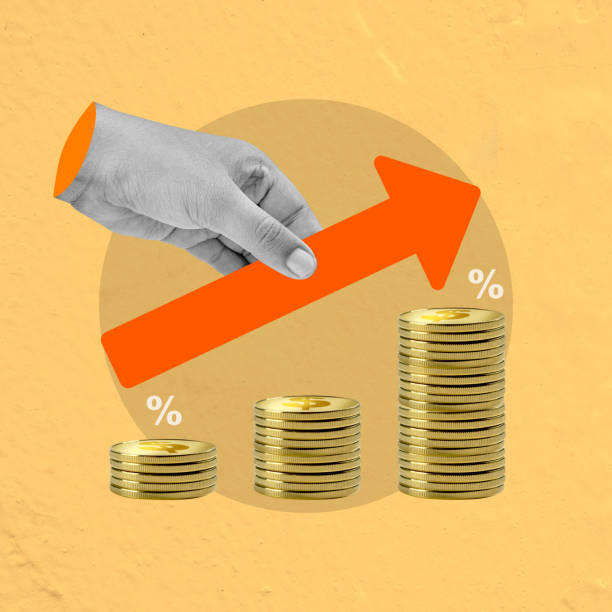 istock Financial growth concept with hand and increasing coin stacks 2156581527