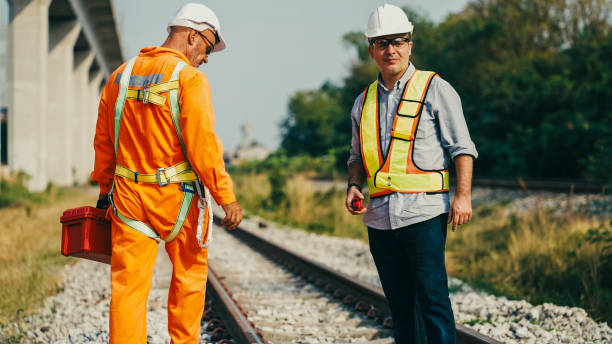 istock Two engineers working for checking the build a high-speed railway. 2156581724