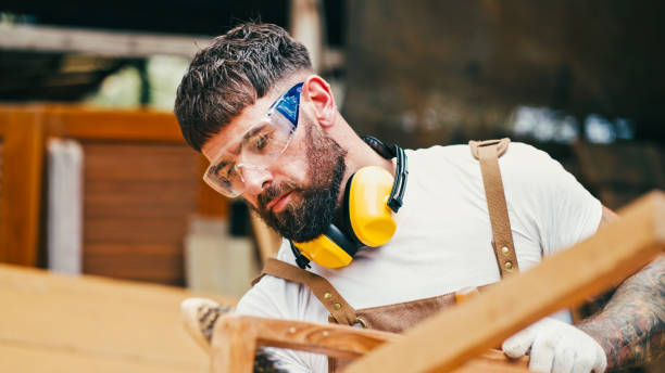 istock Caucasian male carpenter working in furniture workshop. 2156581987
