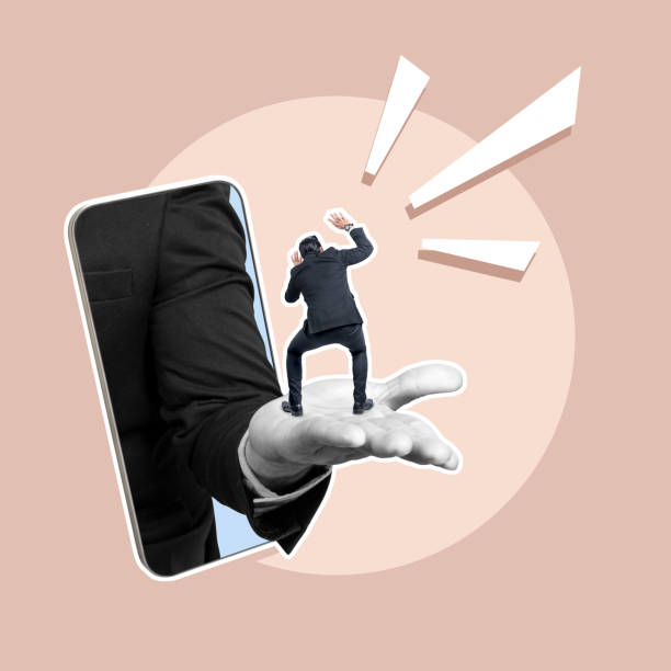 istock A business hand showing a tiny businessman through a mobile phone screen 2156582226