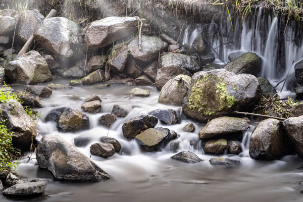 istock A stream of water flows over a rocky riverbed 2156582531