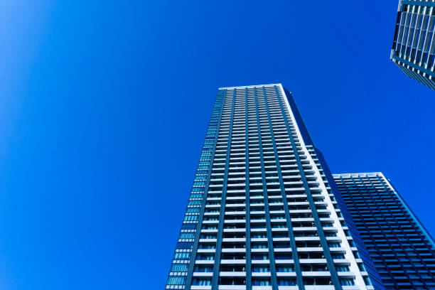 Exterior of high-rise condominium and refreshing blue sky scenery