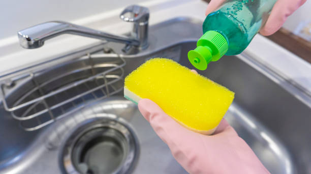 istock foam from a dishwashing sponge in the kitchen 2156592219
