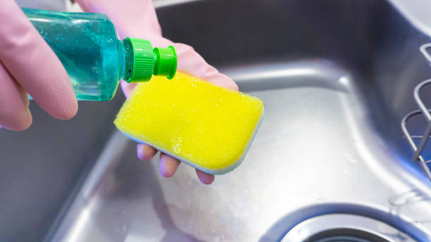 istock foam from a dishwashing sponge in the kitchen 2156592263