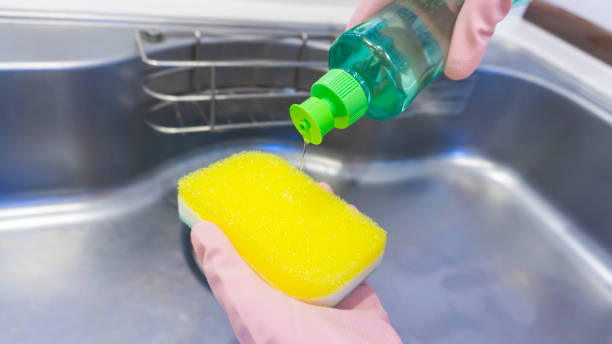 istock foam from a dishwashing sponge in the kitchen 2156592266