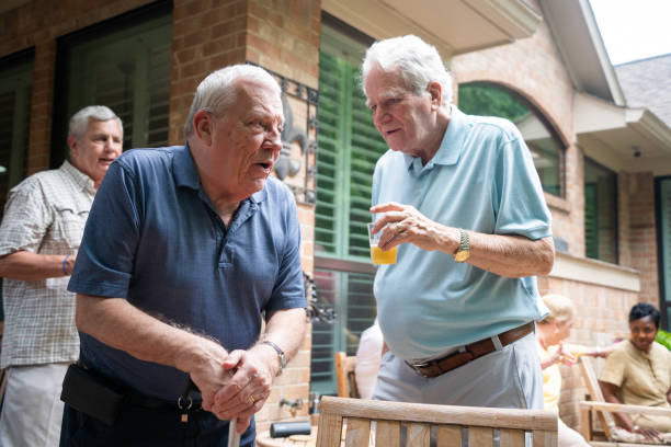 istock Two senior men talking at the cookout 2156593205